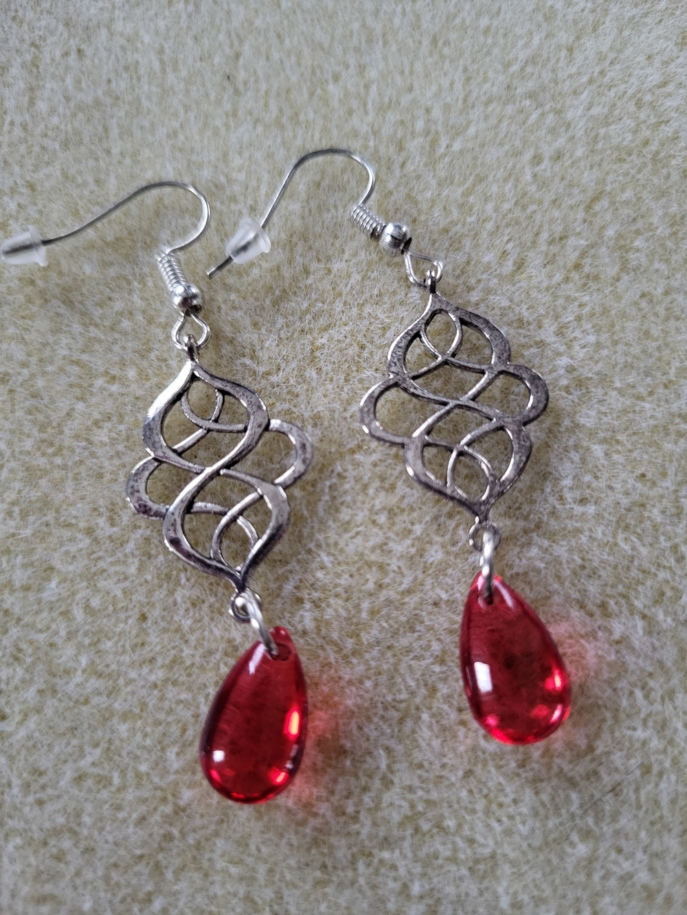 Silver Toned Filigree Drop Earrings with Red Teardrop Accent